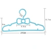 Modern and simple plastic daily necessities green clothes hangers factory direct sales Item Picture